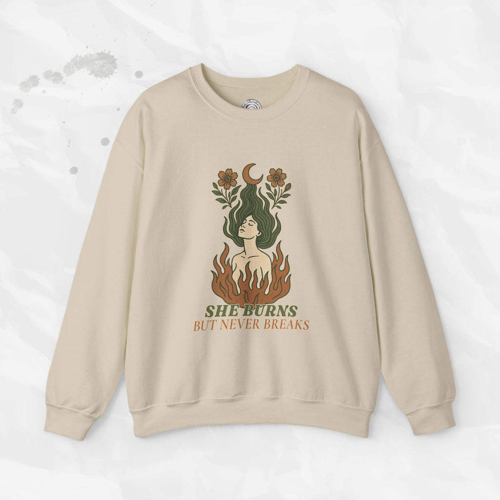 She Burns But Never Breaks – Crewneck Sweatshirt