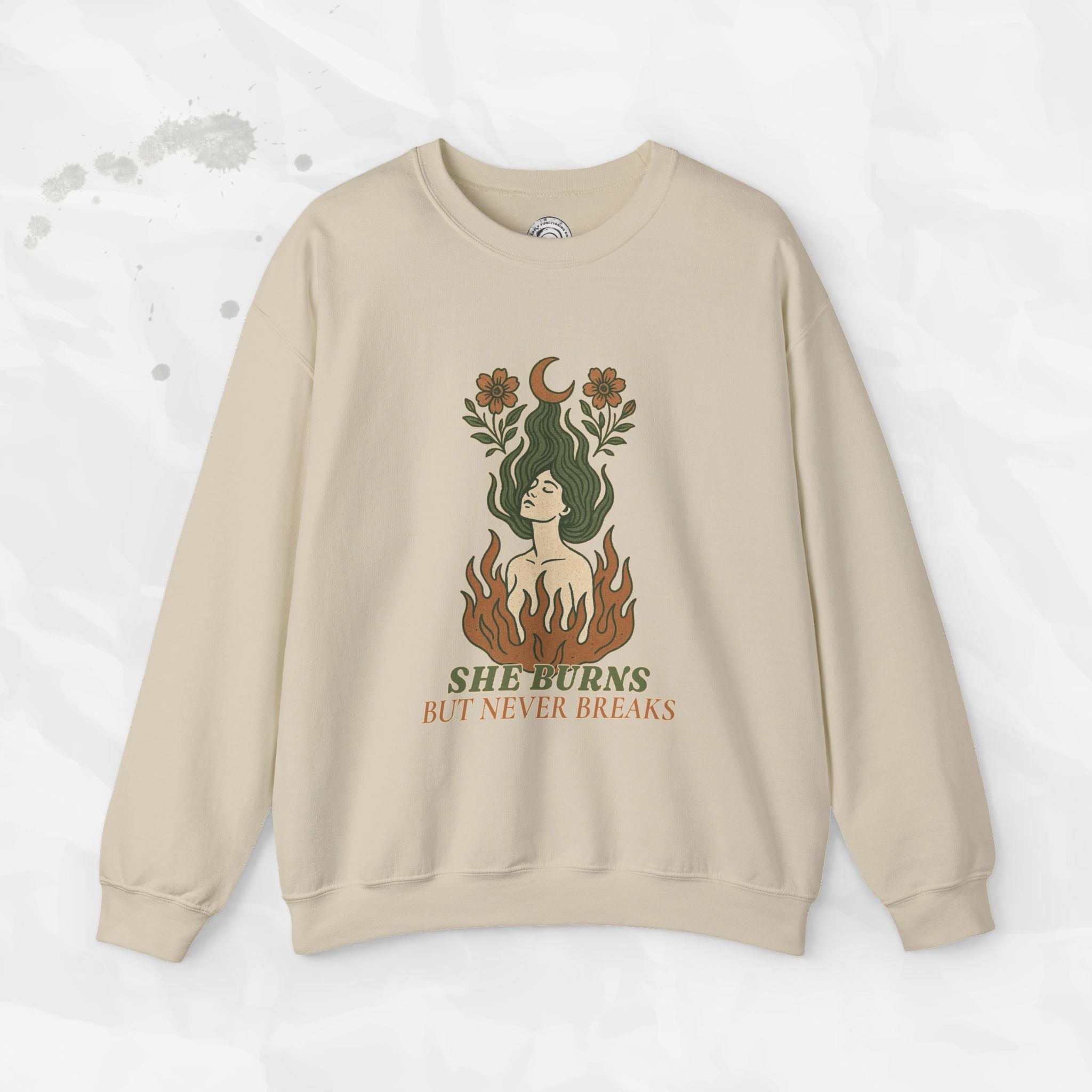 She Burns But Never Breaks – Crewneck Sweatshirt