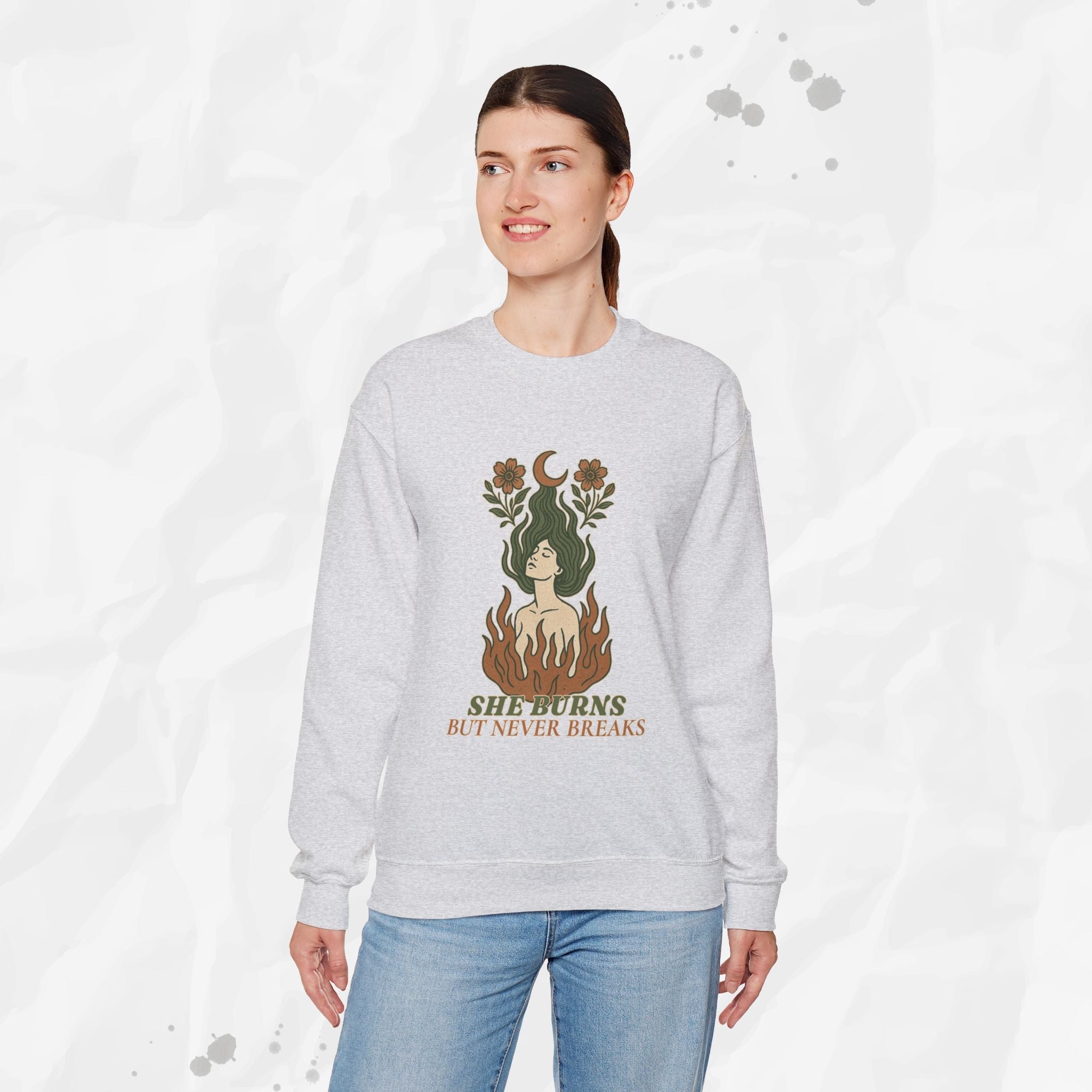 She Burns But Never Breaks – Crewneck Sweatshirt