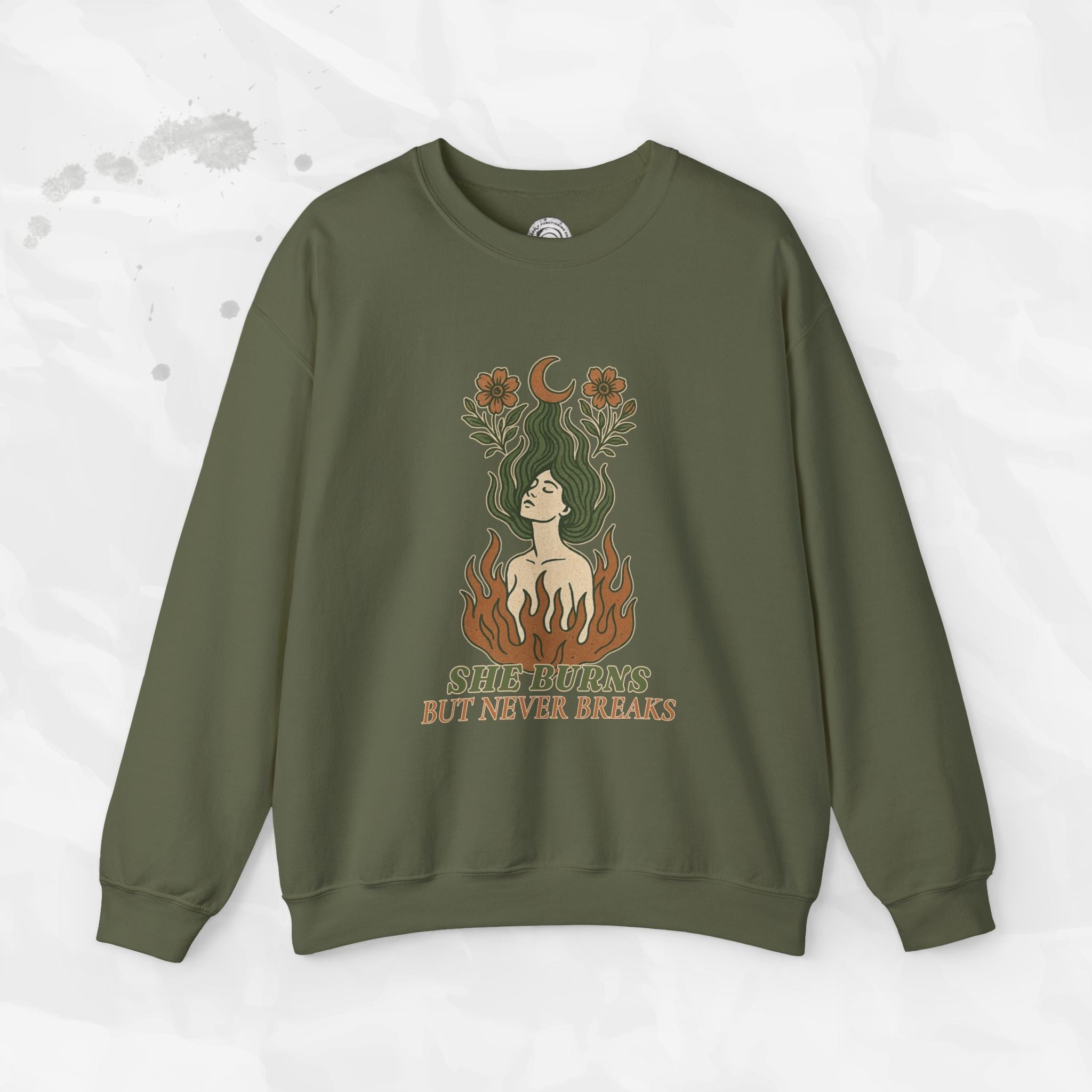 She Burns But Never Breaks – Crewneck Sweatshirt